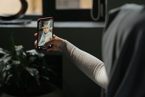 Free Person Holding Iphone 6 Taking Photo of Building Stock Photo