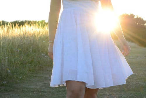 Photo Of Woman Wearing White Dress