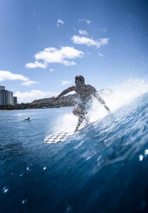 Photo Of Man Surfing