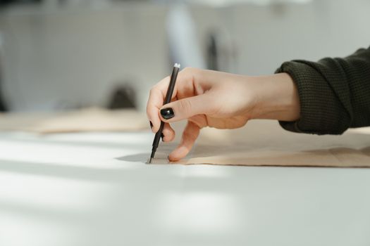 Person Writing on White Paper