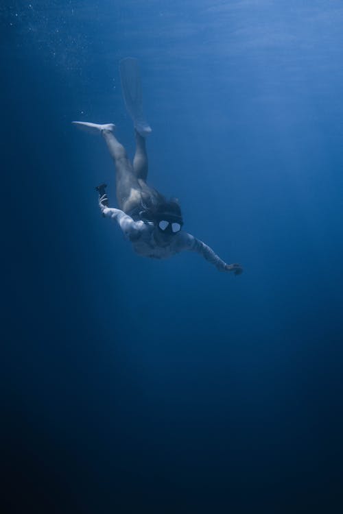 Free Photo Of Woman Swimming Underwater Stock Photo