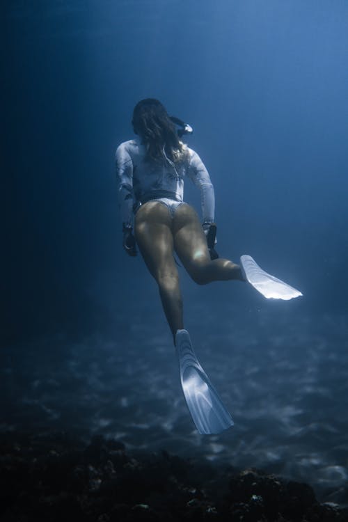 Free Photo Of Woman Swimming Underwater Stock Photo