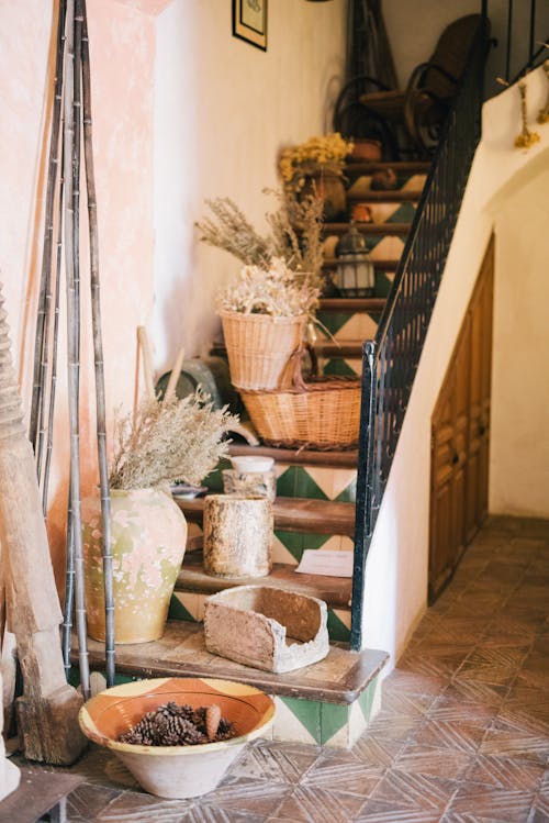 Woven Baskets and Jars on a Staircase