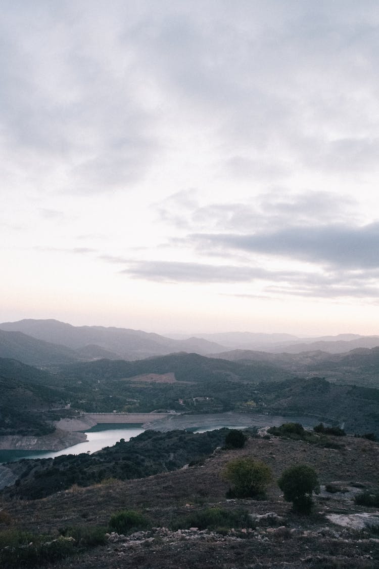 Mountain Ranges Surrounding A Body Of Water