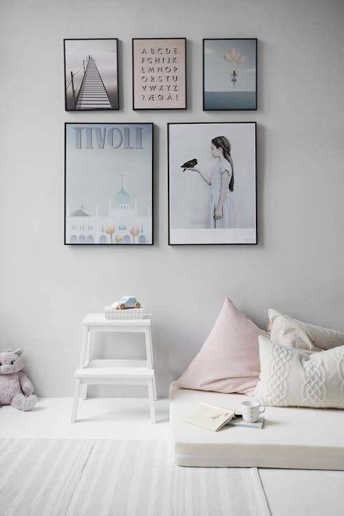 Free Five Posters Mounted on Wall Stock Photo