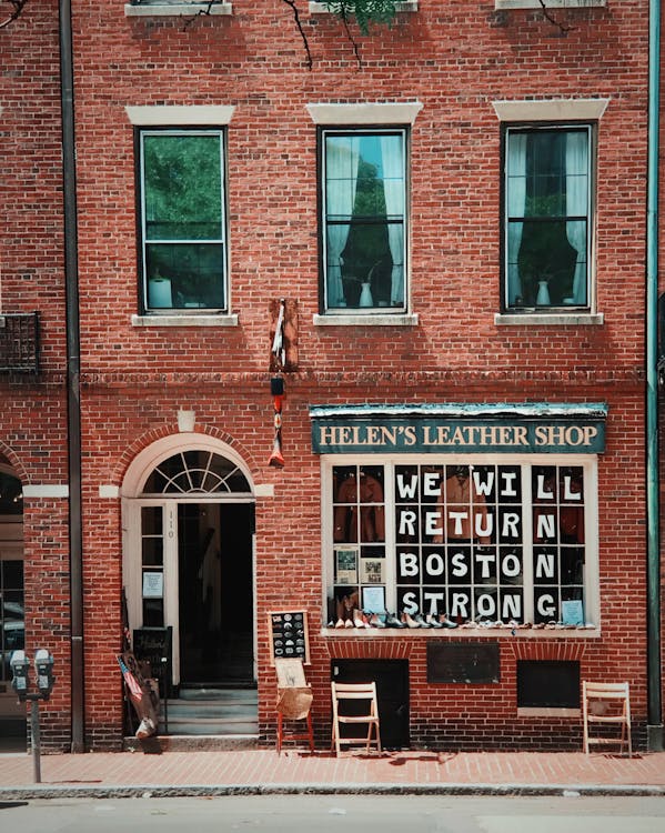 Brown Brick Building With Red Brick Wall