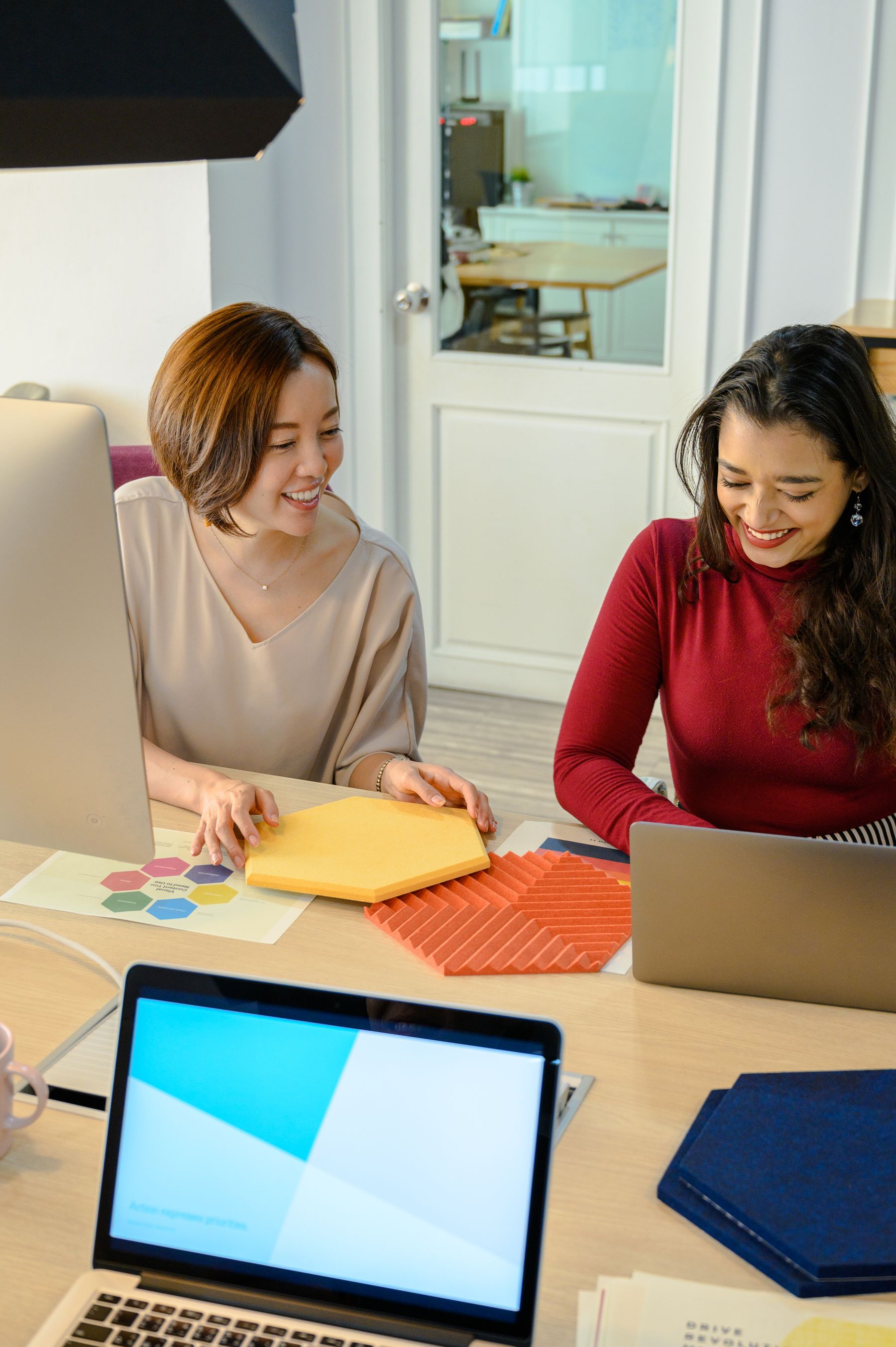 East Asian recruitment professional conducting a formal business interview
