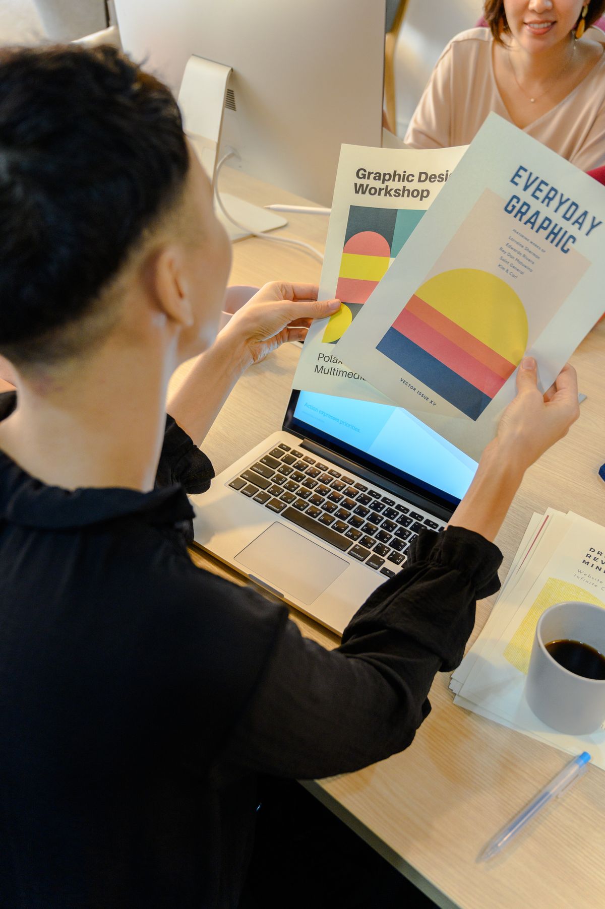 Reviewing graphic design brochures