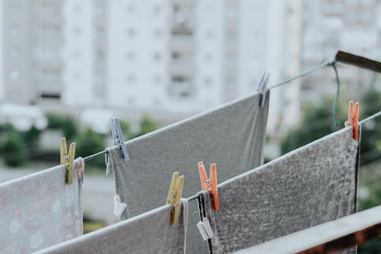 Gray Clothes Hanging On Rope