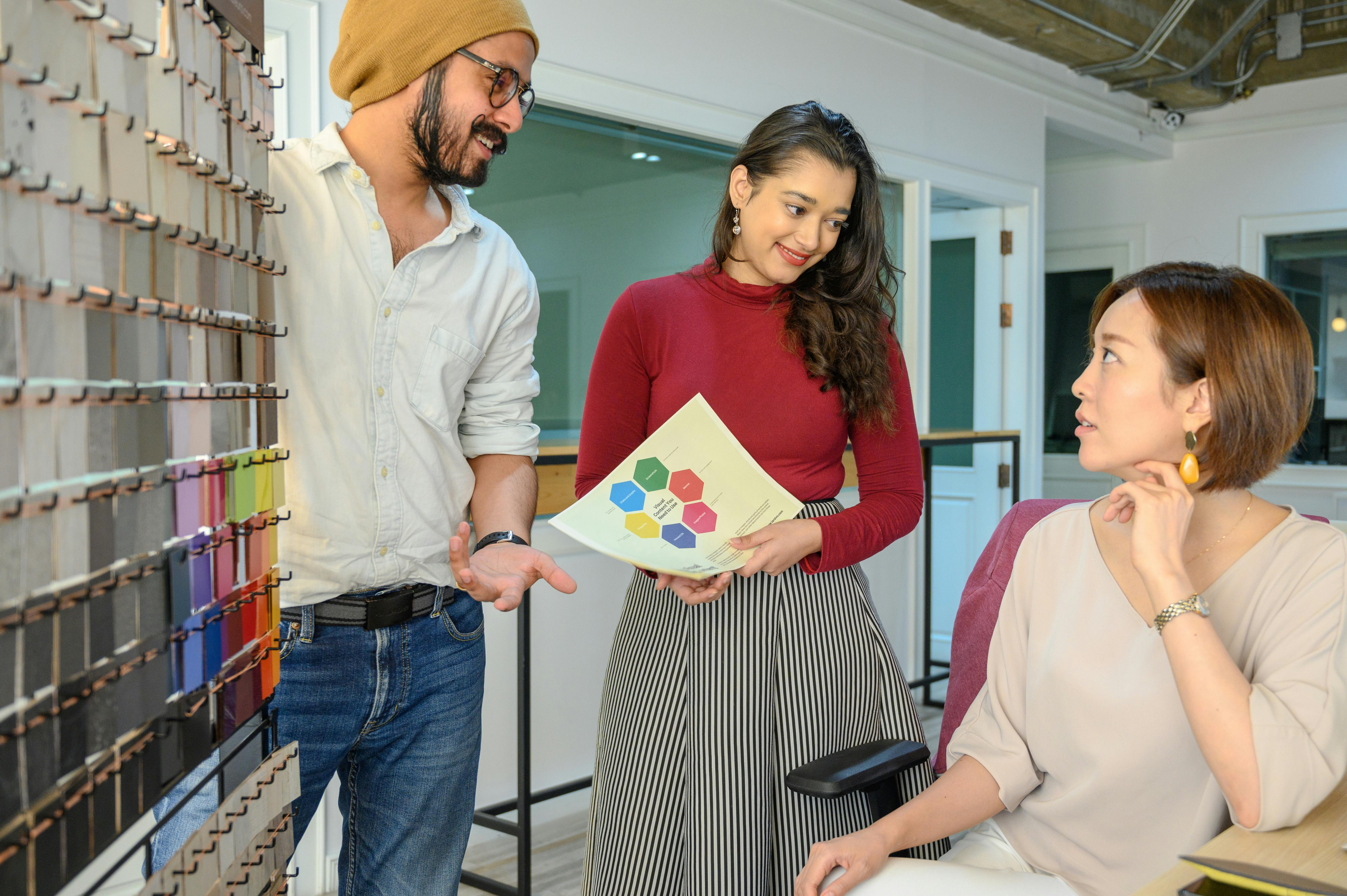 people in front of hanging colorful cards