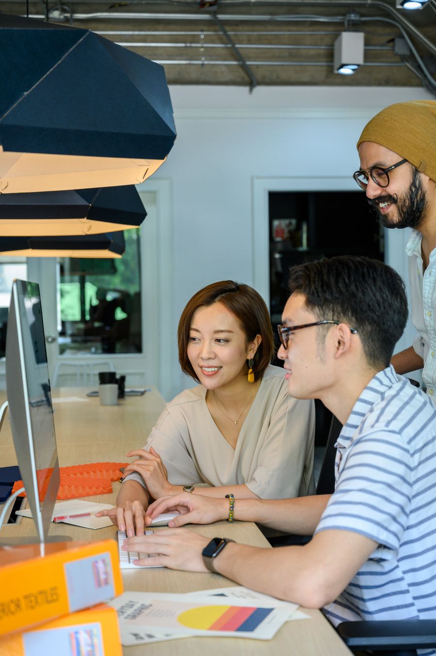 Team planning a digital strategy together in a bright workspace