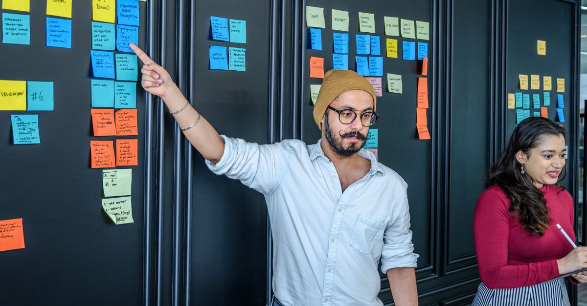 Man Showing Sticky Notes · Free Stock Photo