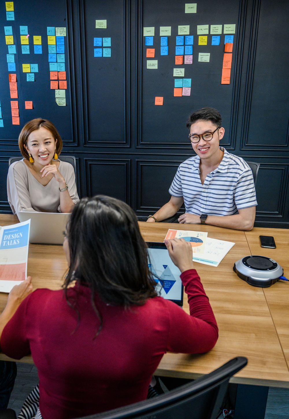 Colleagues planning together in an office