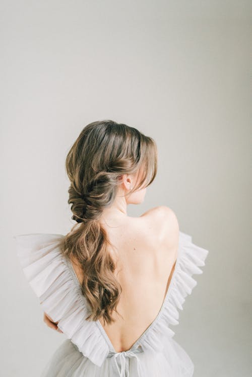 A Woman in White Backless Dress