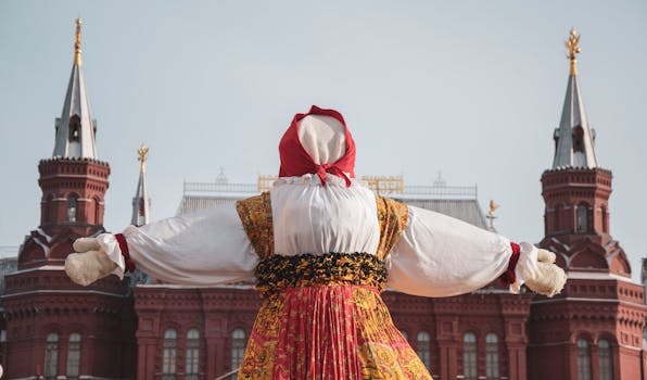 A vibrant festival doll at Maslenitsa in Moscow's Red Square, highlighting Russian culture.