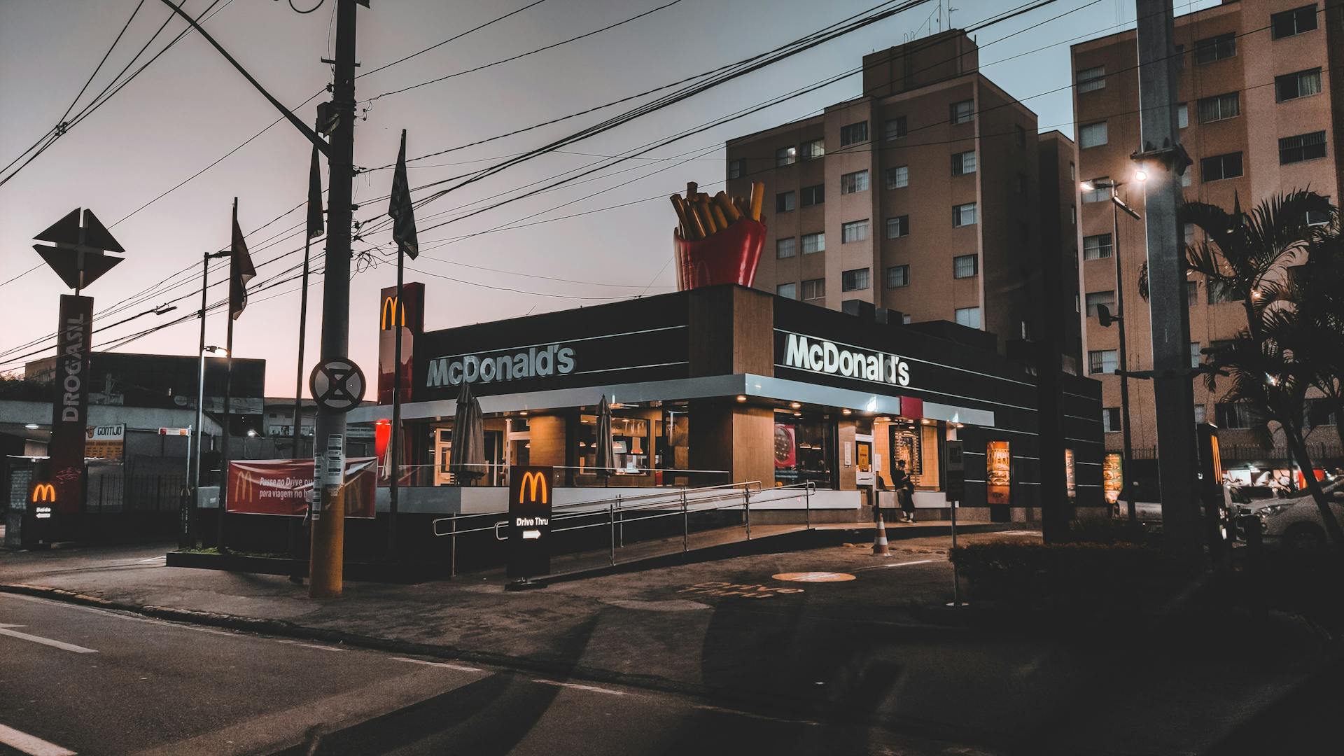 Empty street in suburb area with small fast food restaurant