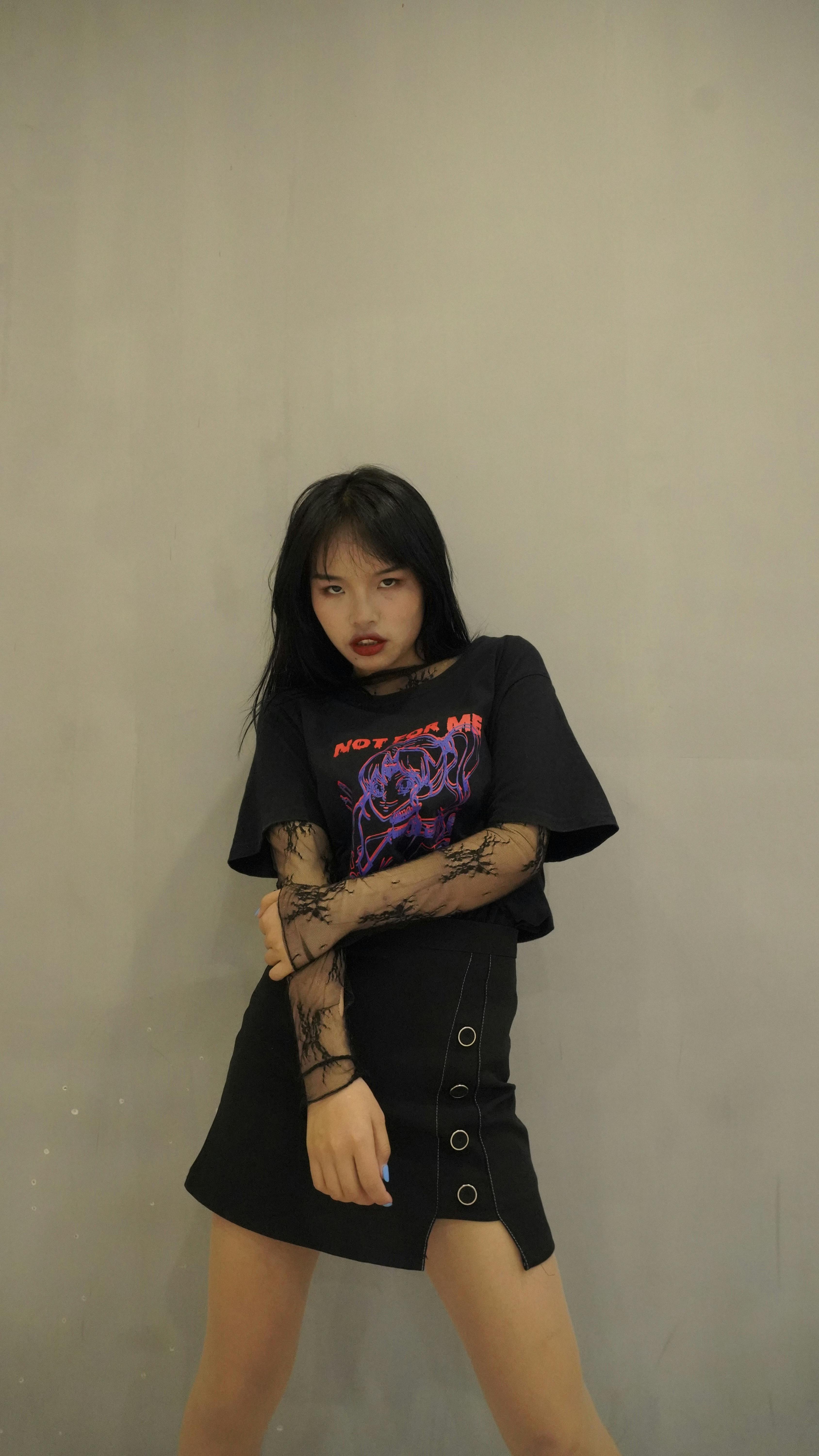 Two older women talking and laughing together outdoors