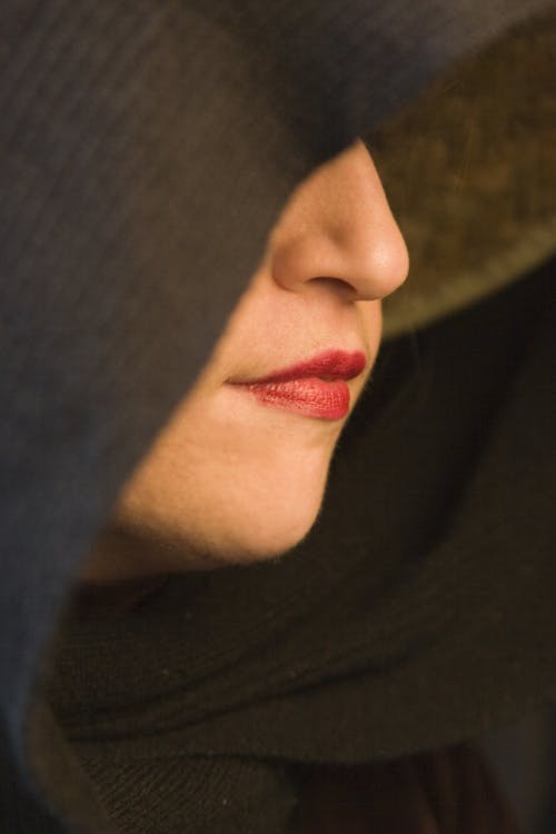 Close-up Photography of Woman Wearing Red Lipstick