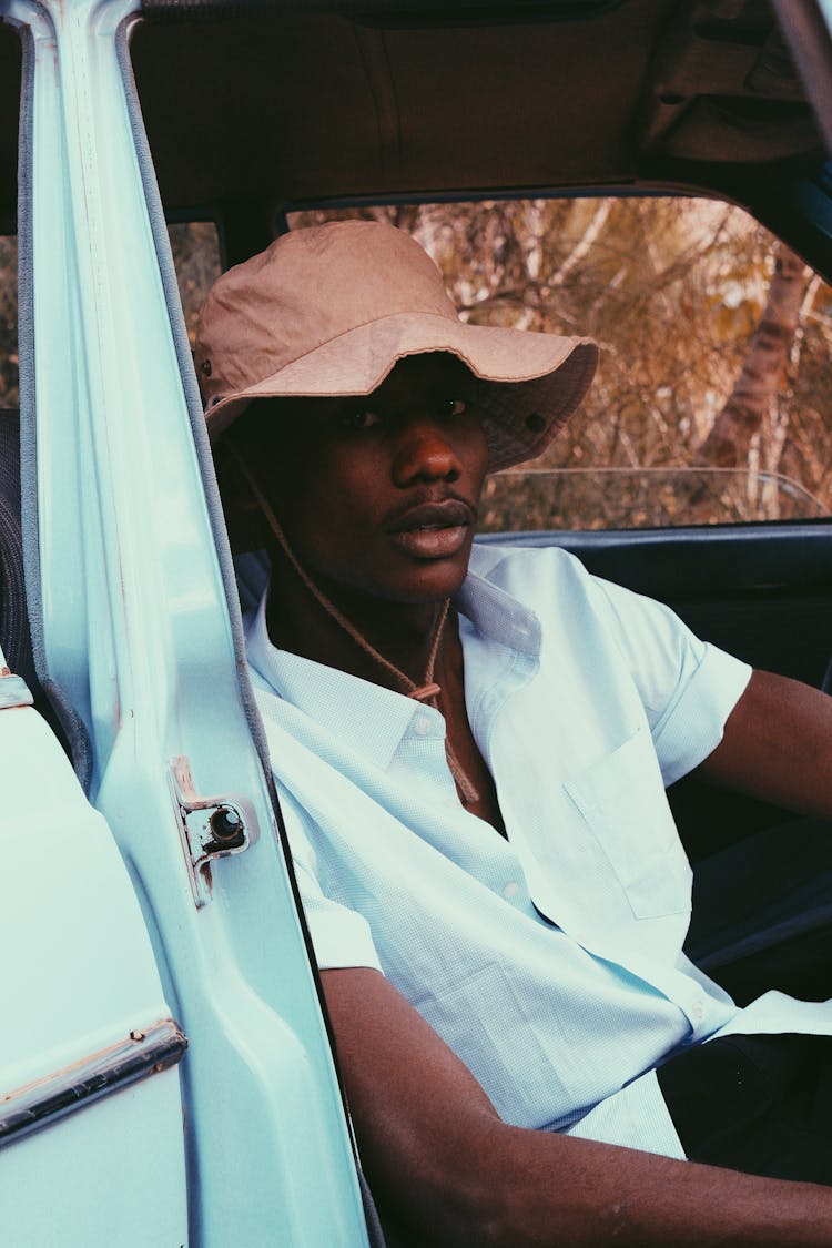 Stylish African American Man Resting In Car