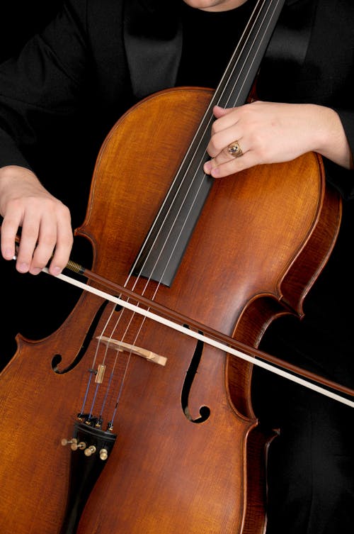 Person Playing Cello