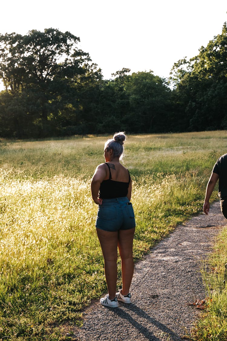 Plump Teen Girl Standing On Path In Field