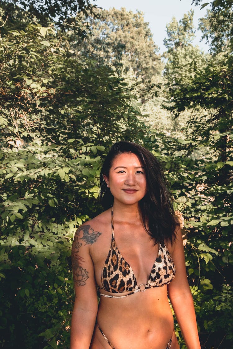 Young Ethnic Woman In Bikini Enjoying Summer