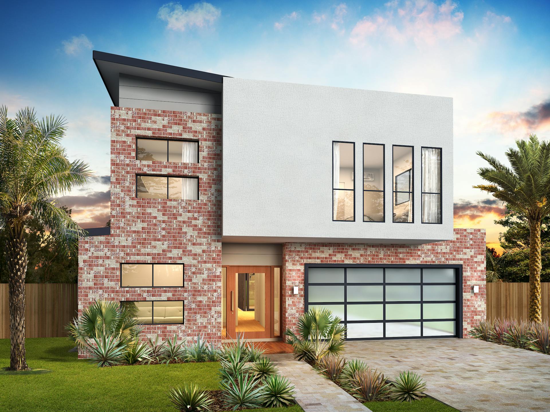 Contemporary two-story home with brick and stucco facade, surrounded by tropical landscaping.