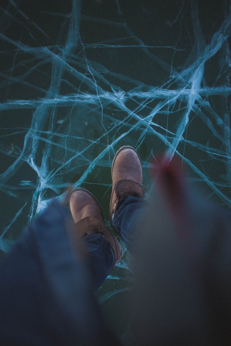 Standing On Glass With Cracks