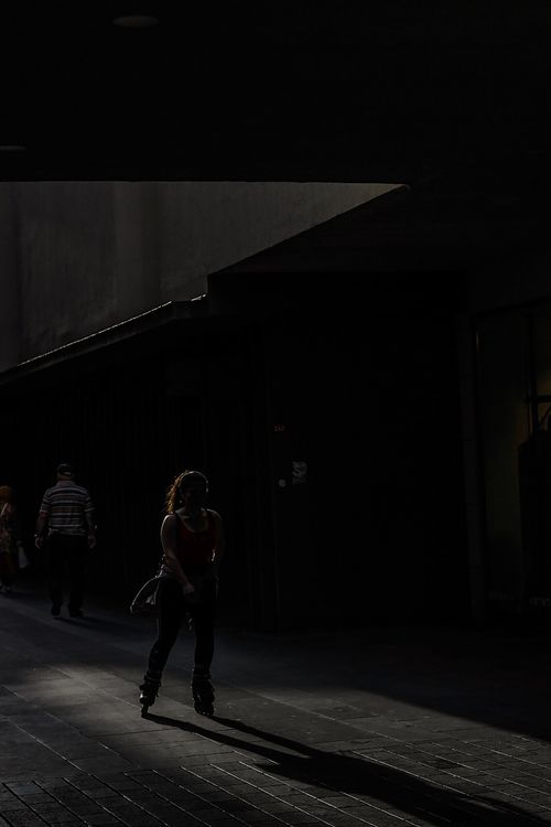 Free Shadowy silhouette of a person rollerblading in an urban setting, İstanbul. Stock Photo