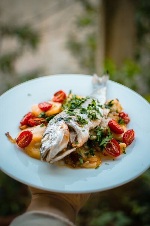 Free Fish With Vegetables on White Ceramic Plate Stock Photo