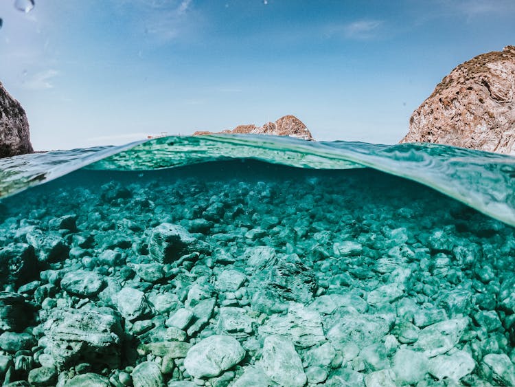 Underwater Bed Of Rocks On Sea