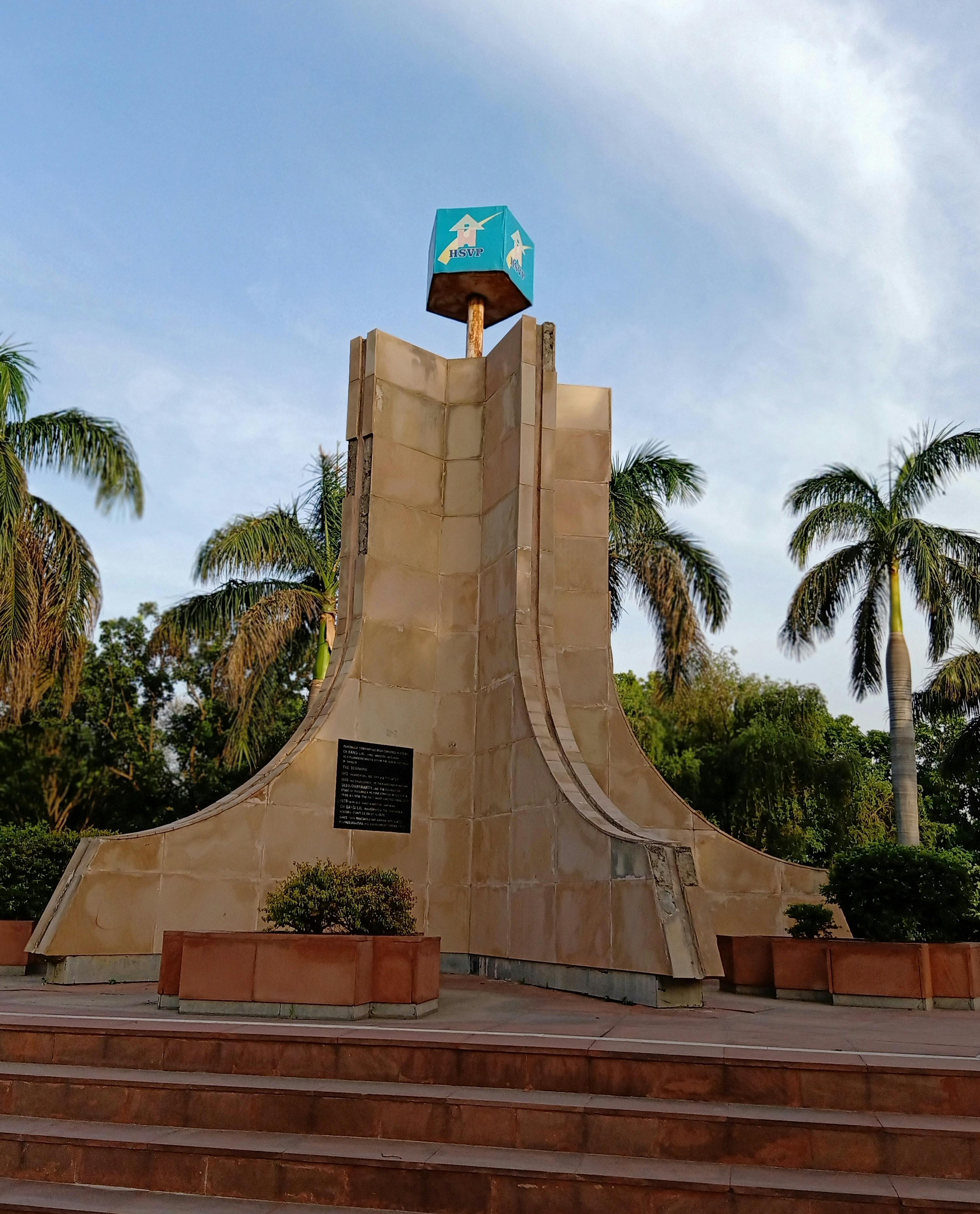 Sensual couple in intimate embrace on bed, autumn rain on window, warm candlelight highlighting bare skin and tender touch