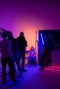 People Standing and Singing on Stage