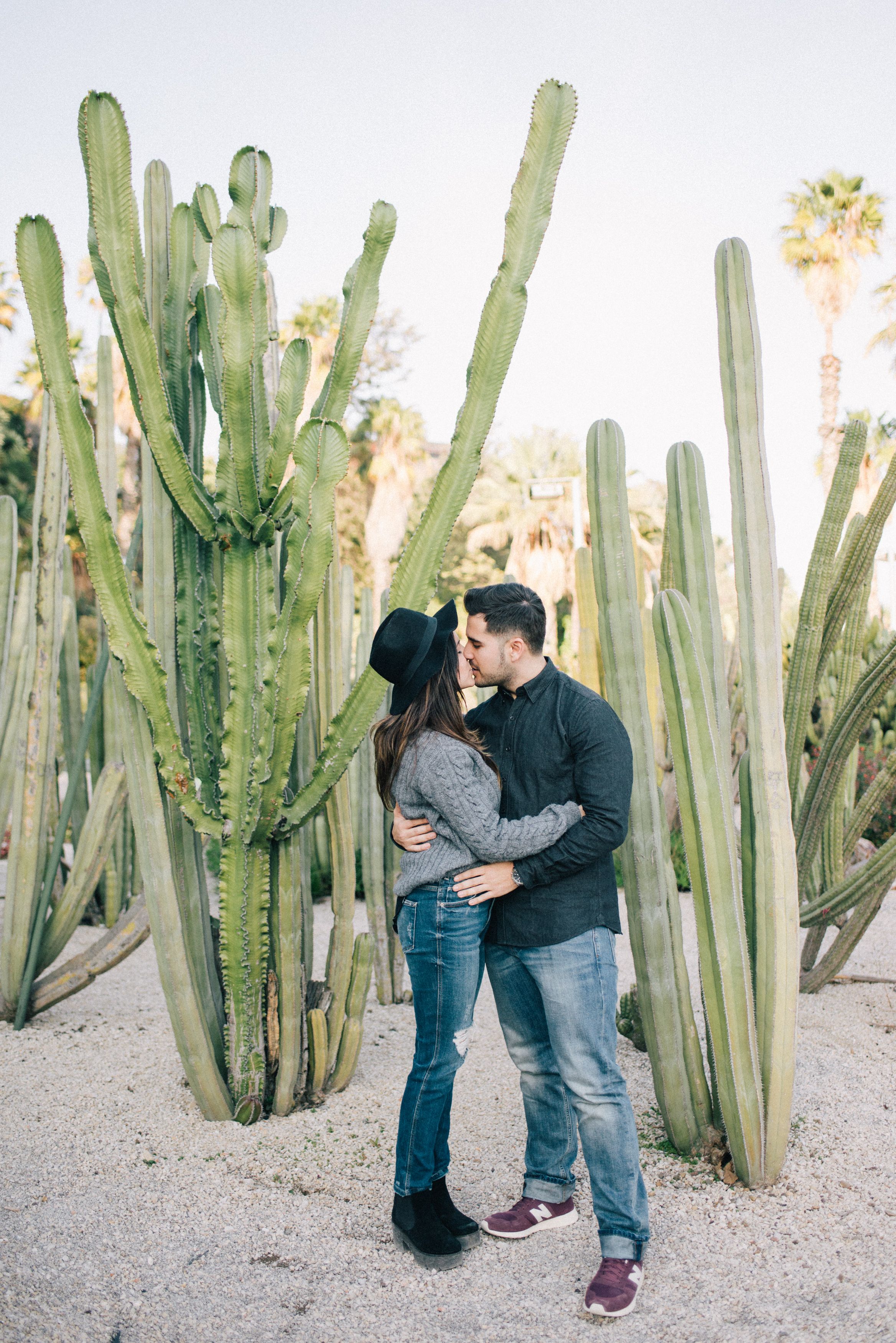 Woman in Leather Jacket Kissing a Man · Free Stock Photo