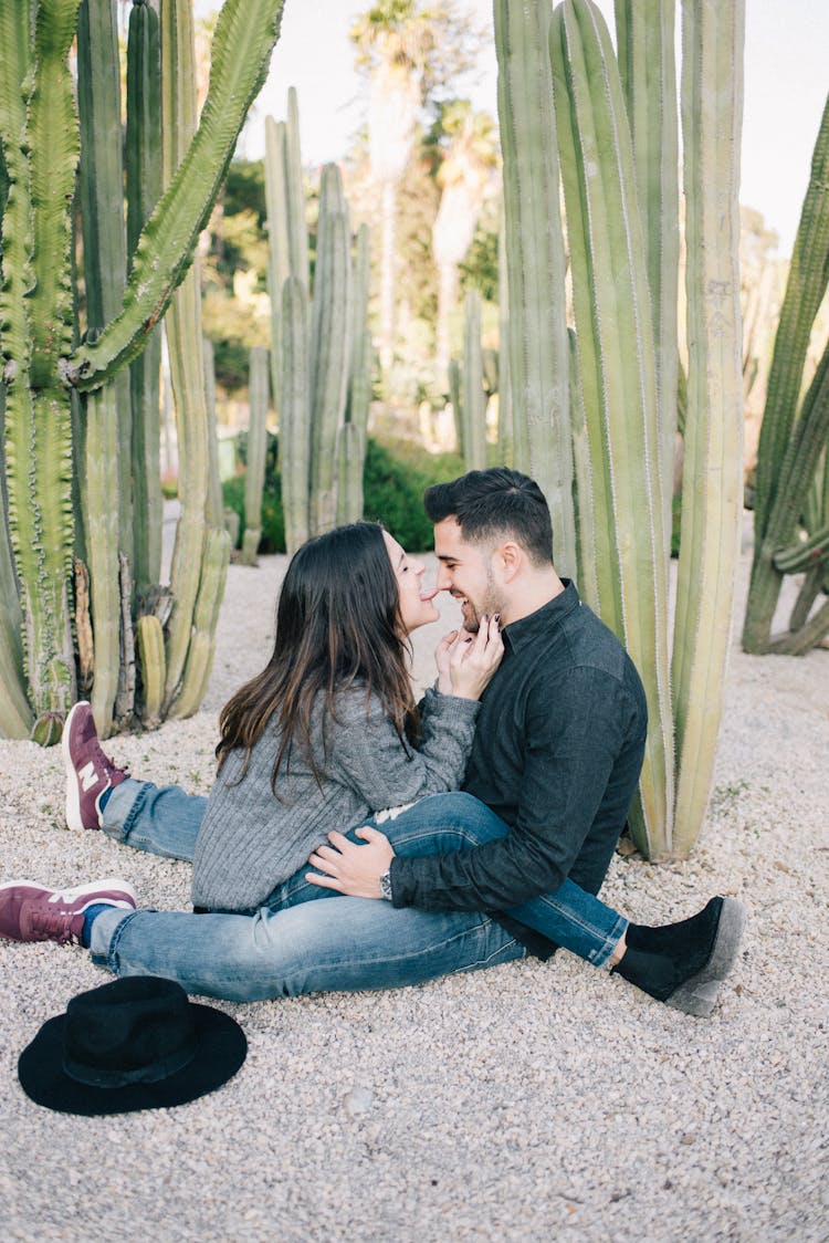 Woman Licking The Nose Of A Man