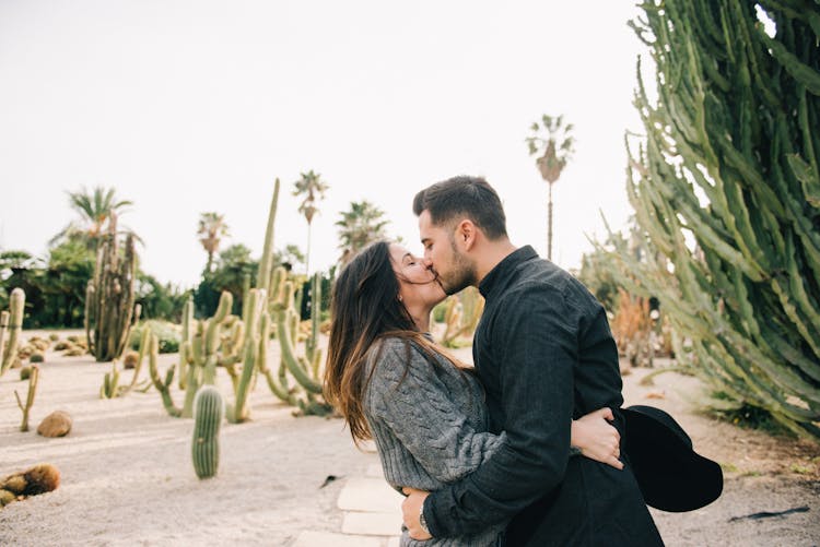 Photo Of Man Kissing Woman 