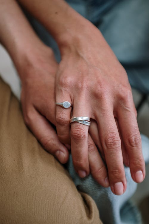 Close-Up Photo Of People's Hands