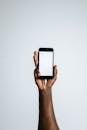 Photo Of Person Holding Smartphone