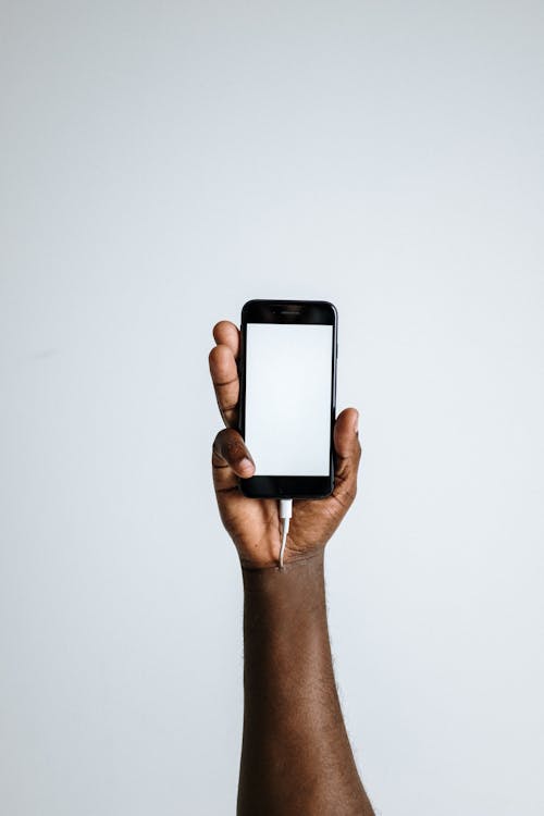 Photo Of Person Holding Smartphone