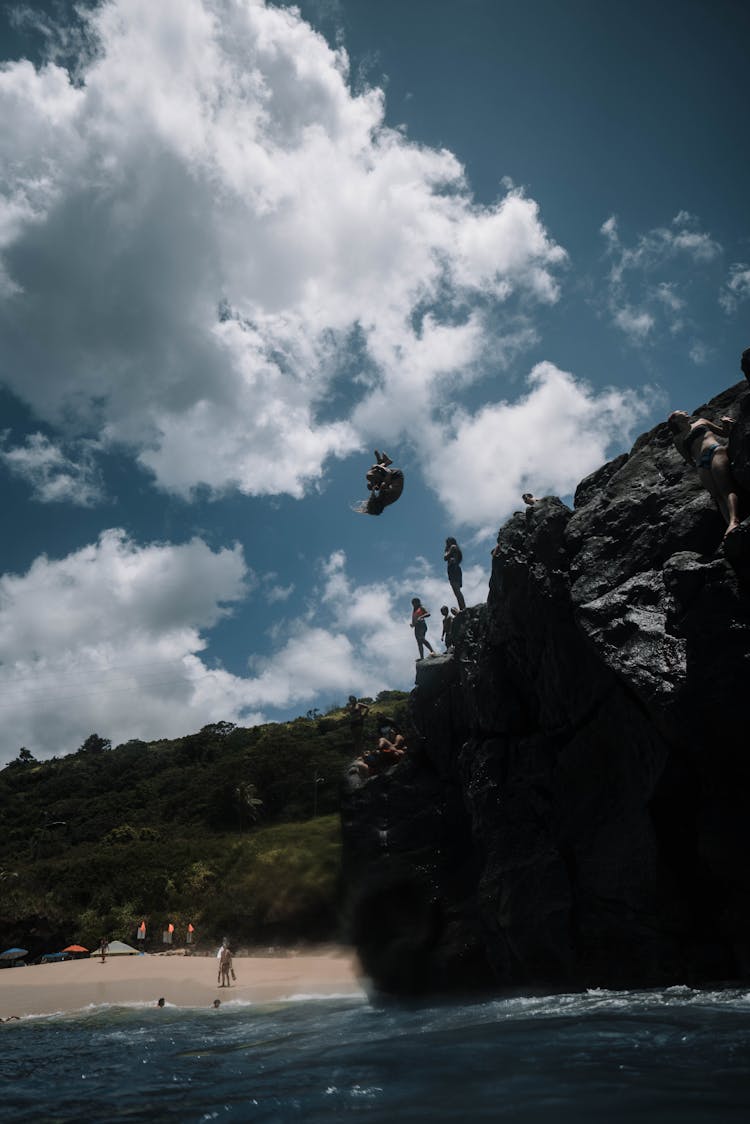 Photo Of Person Diving In The Ocean 