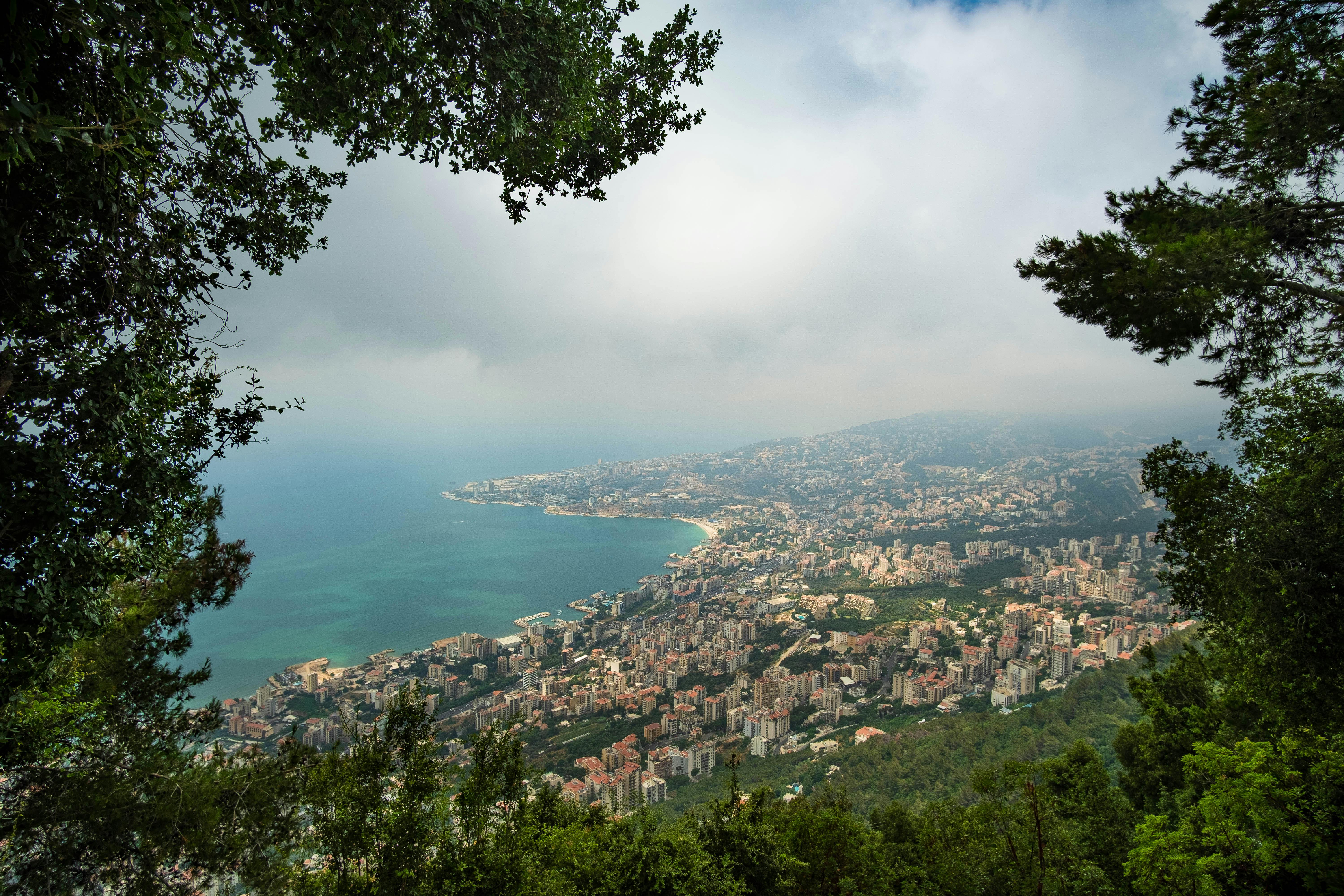 Beirut city beach blue buildings lebanon rawshe rocks sunny HD  phone wallpaper  Peakpx