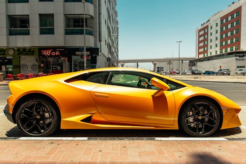 Photo Of Yellow Lamborghini Beside Road