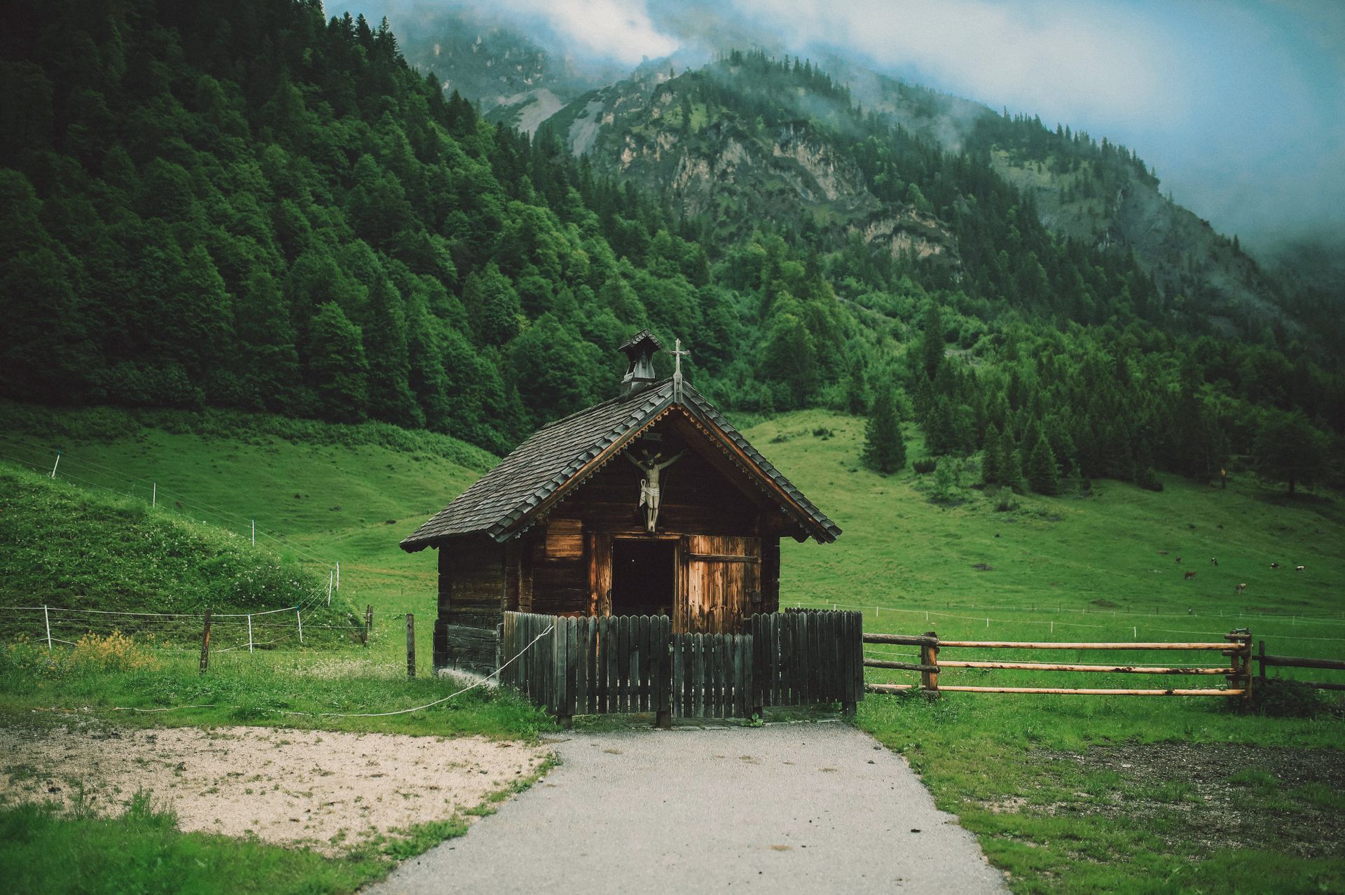 Brown Wooden House Surrounded by Grass
