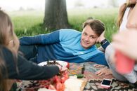 Teenage People Having Picnic in Park 