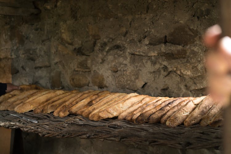 Bread Displayed On A Shelf