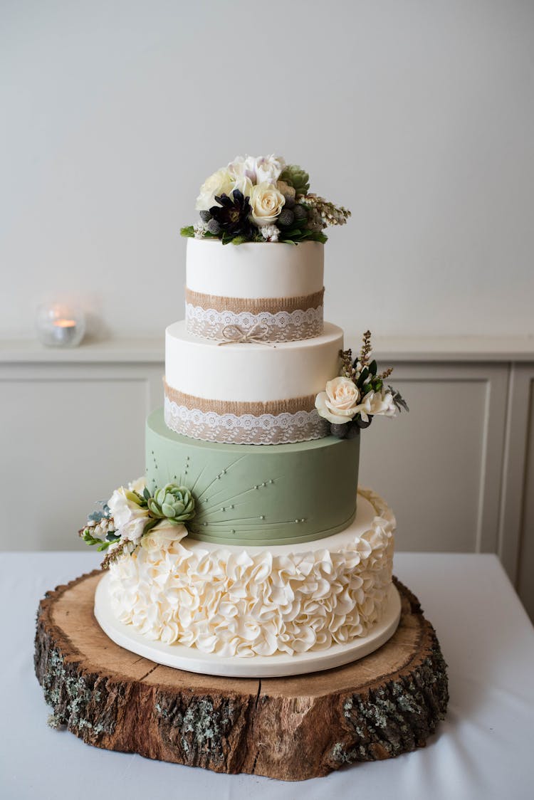 Big Wedding Cake On Wooden Slab Board