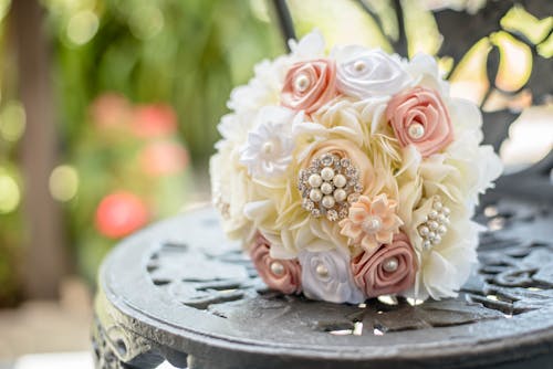 Bouquet of artificial roses in park