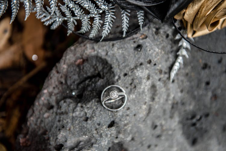 Rings With Diamond On Rough Stone On Wedding Day