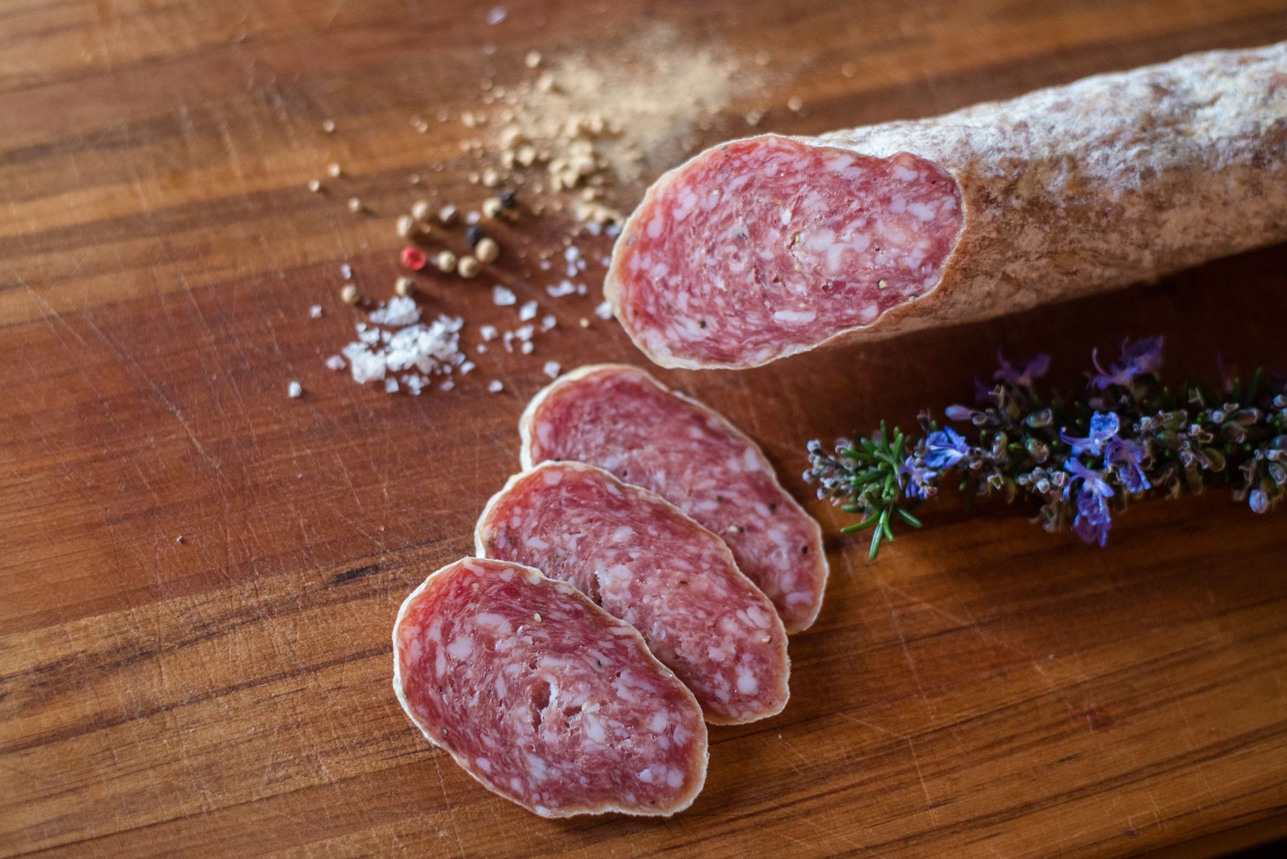 Soppressata sandwich with provolone and arugula on a baguette