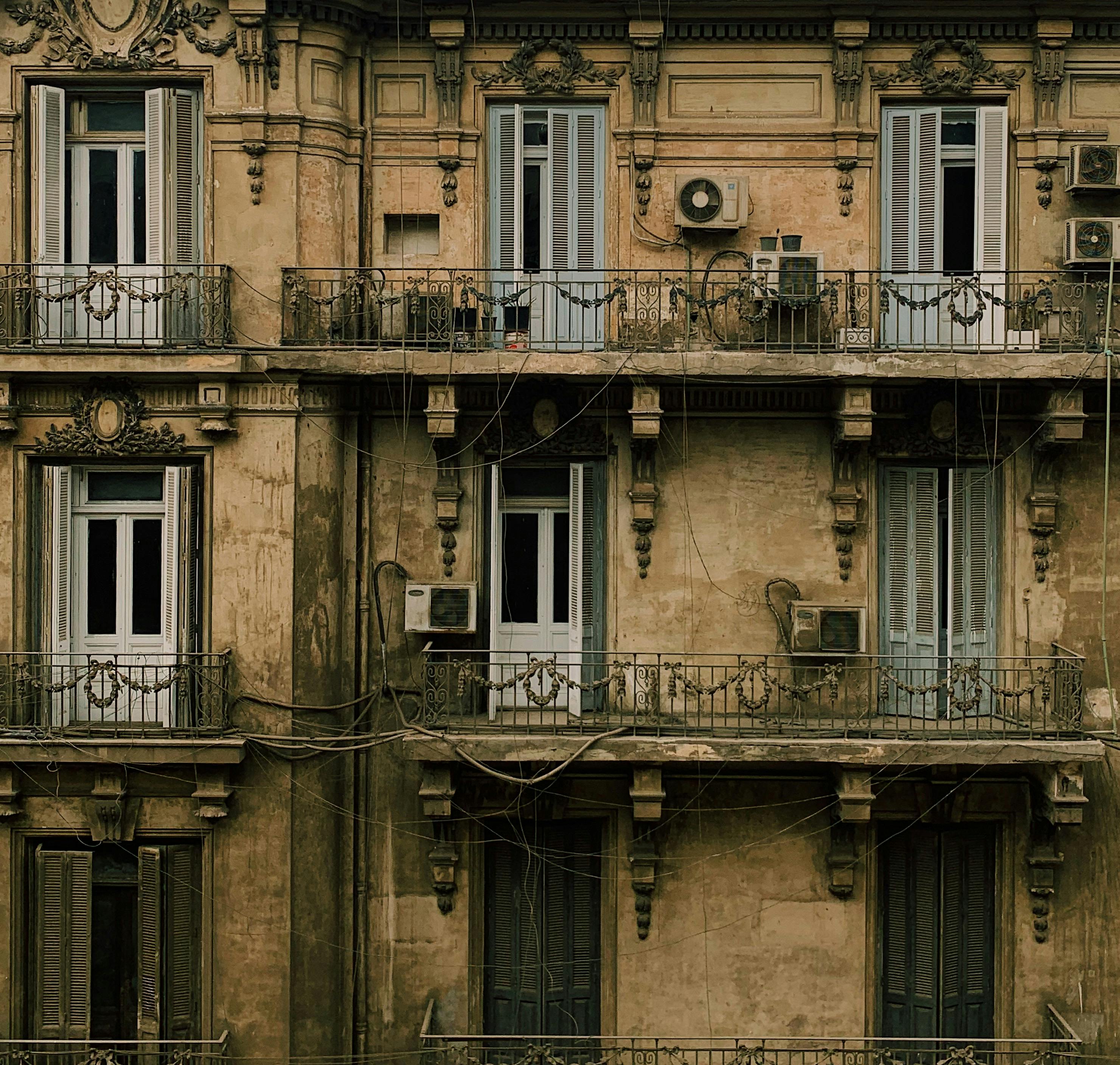 background of old building facade with terraces